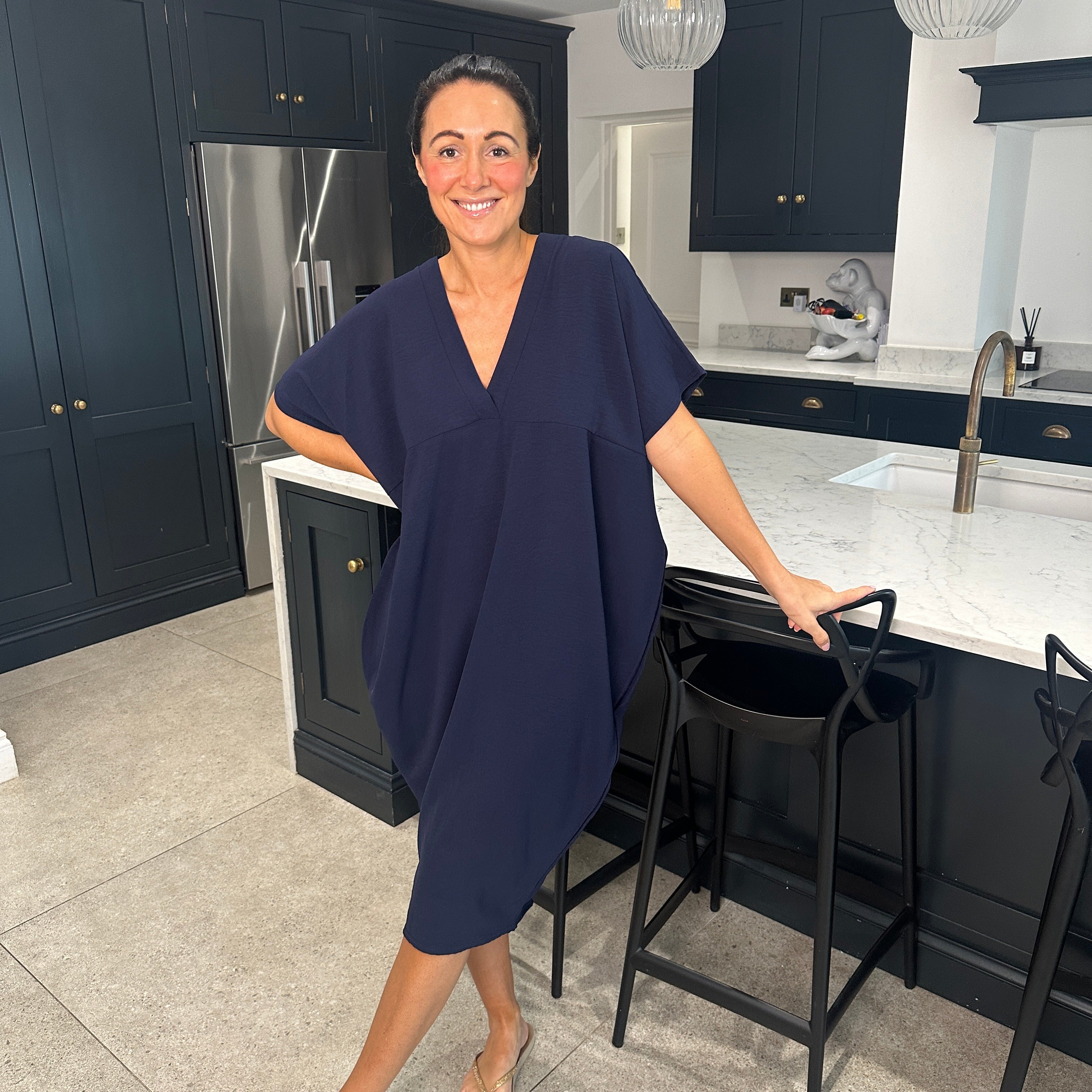 Faylinn - Comfortable dress with V-neckline