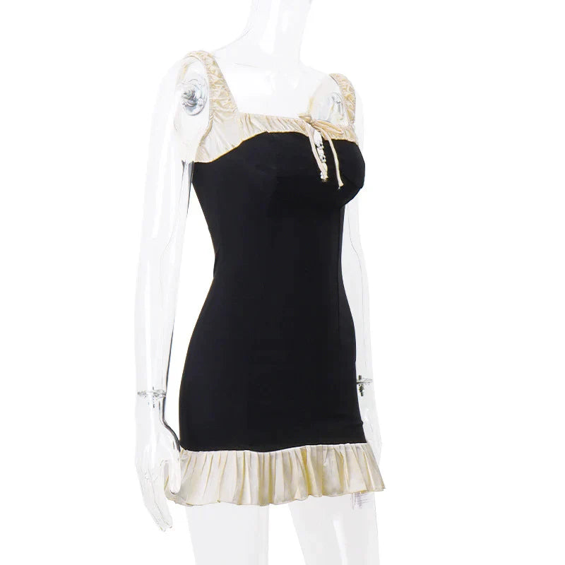 Gracie - Pleated mini dress with button placket