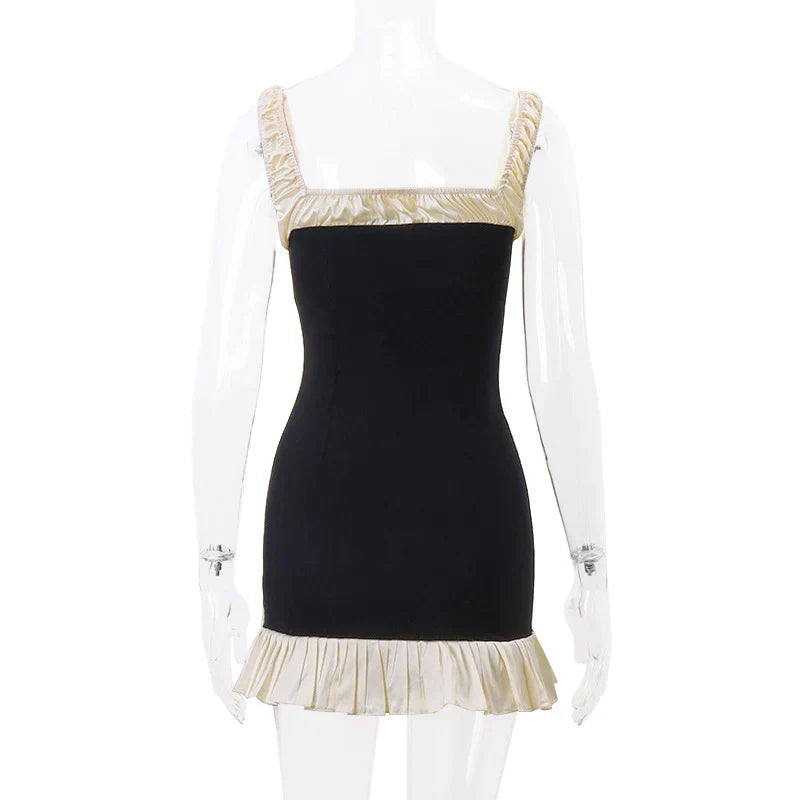 Gracie - Pleated mini dress with button placket
