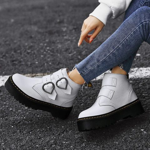 Fashionable ankle boots with heart-shaped buckles