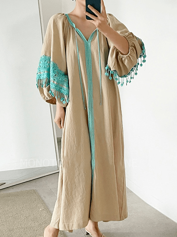 Simple dress in ethnic style with fringes