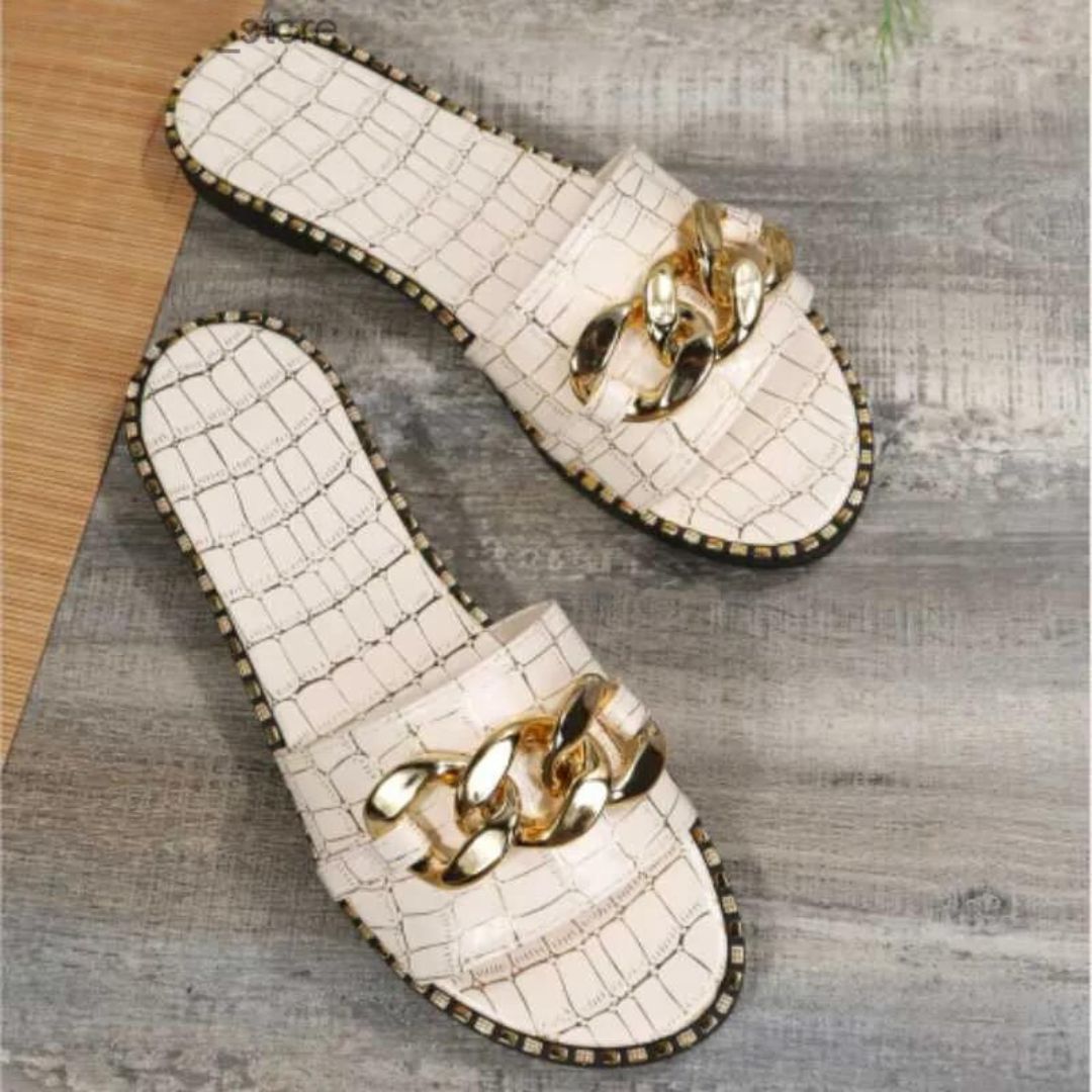 Alice- Mules with crocodile pattern