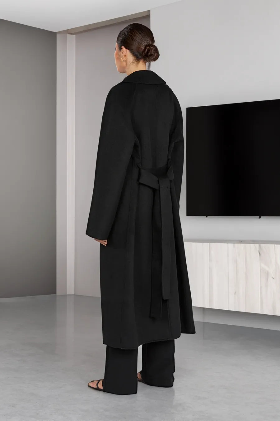 Stylish long women's trench coat in oversize style