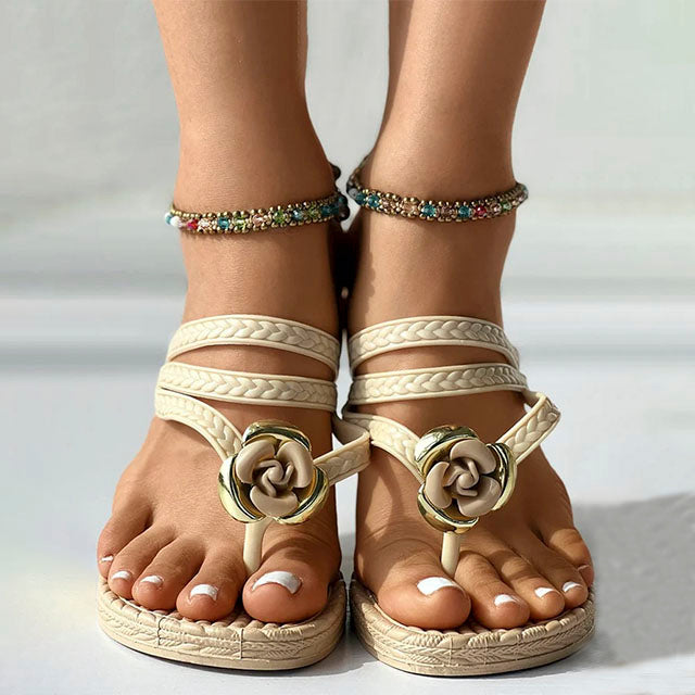 Liezl - Braided sandals with floral embellishment