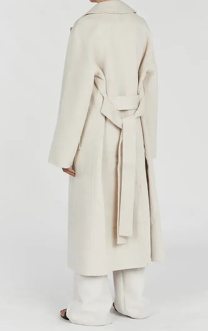 Stylish long women's trench coat in oversize style