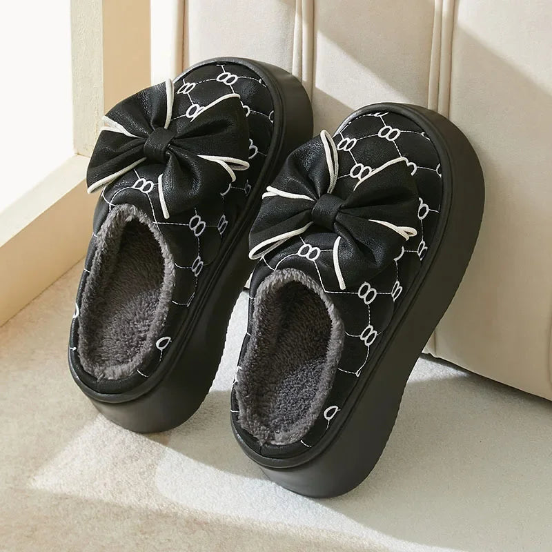 Elegant slippers with decoration and bow