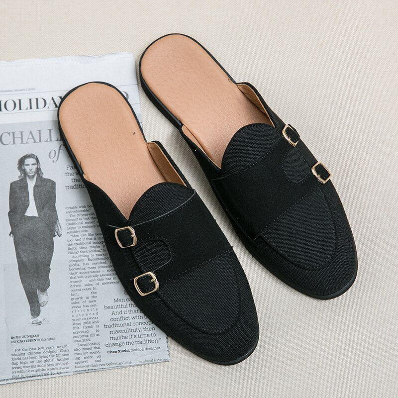 Nolan - Modern mules with buckles in a two-colour look