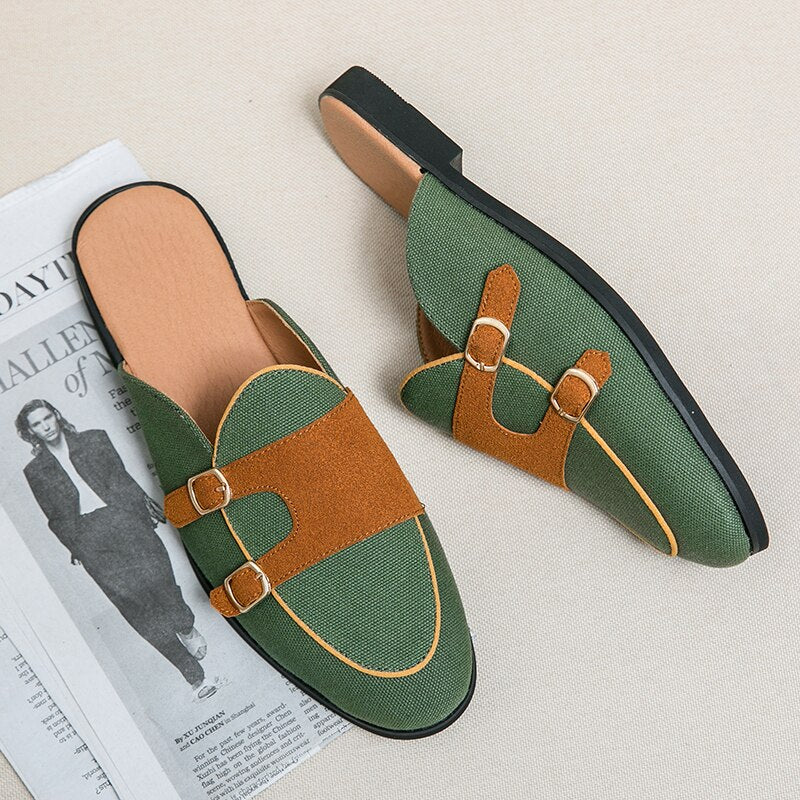 Nolan - Modern mules with buckles in a two-colour look