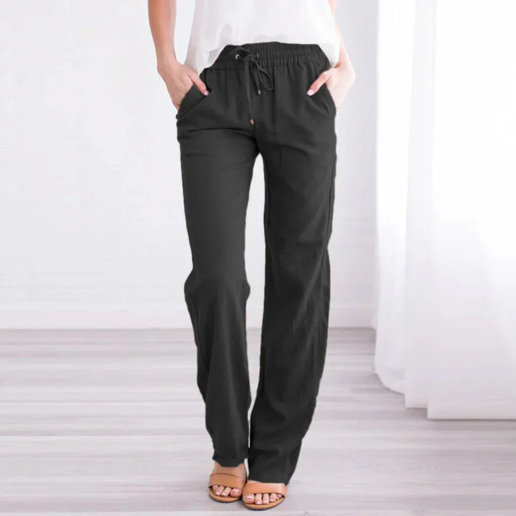 Loose trousers with wide leg and drawstring