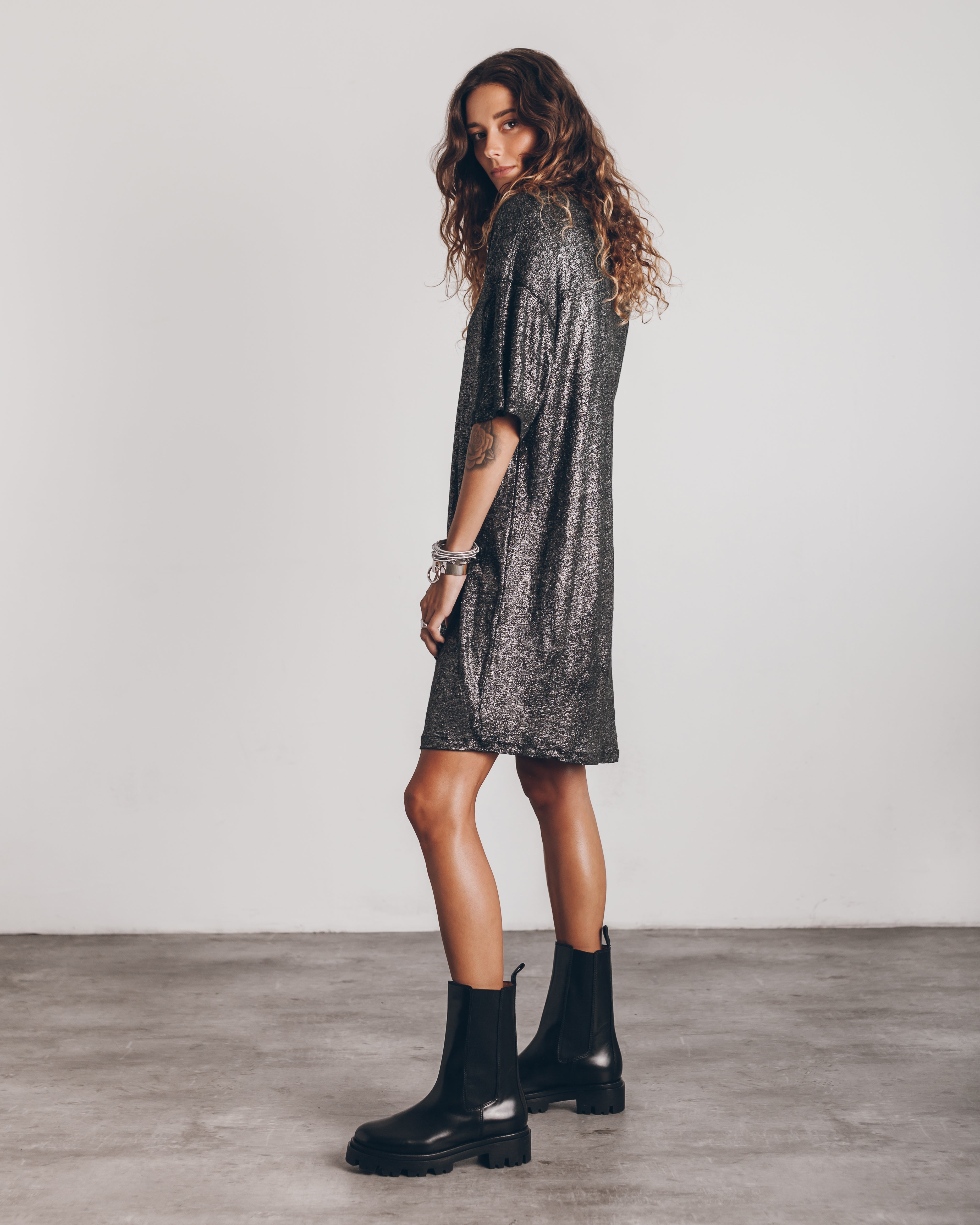 The dark glittering linen dress