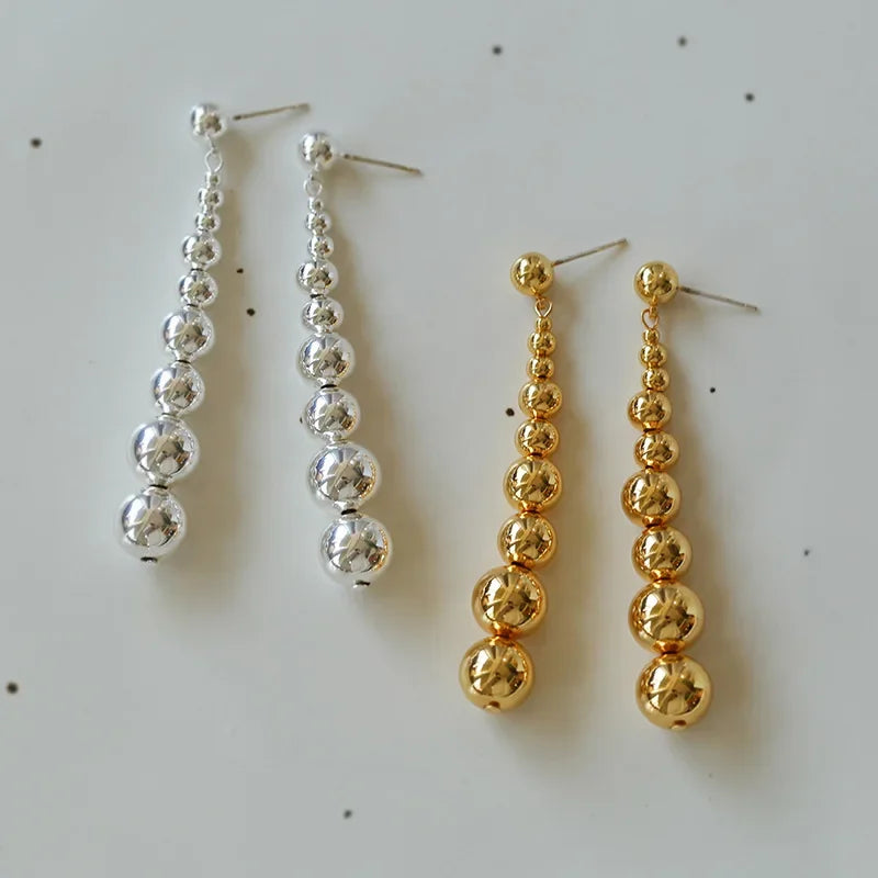 Ava - Chic earrings with metallic pearl strands