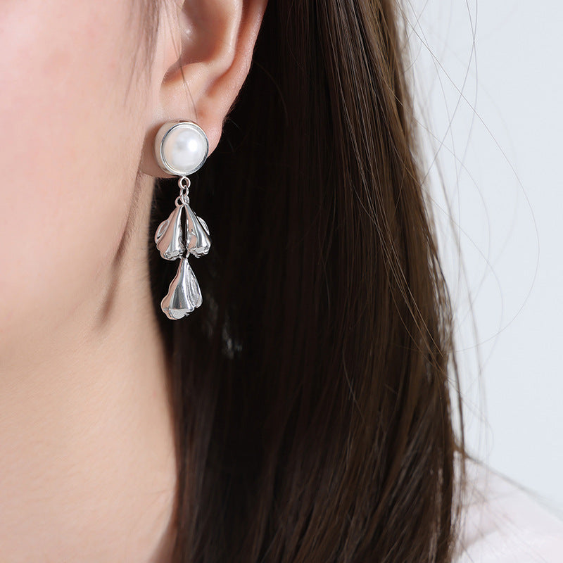 Aurelia - Pearl stud earrings with textured teardrop pendants