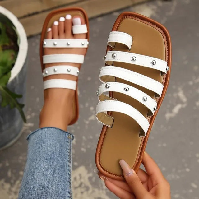 Lara - Flat strappy sandals with studs