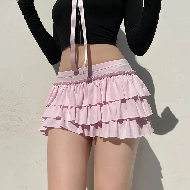 Mia - Shorts with ruffled hem and satin bow detail