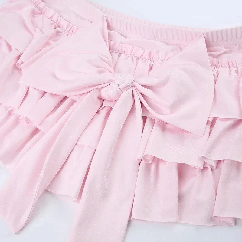 Mia - Shorts with ruffled hem and satin bow detail