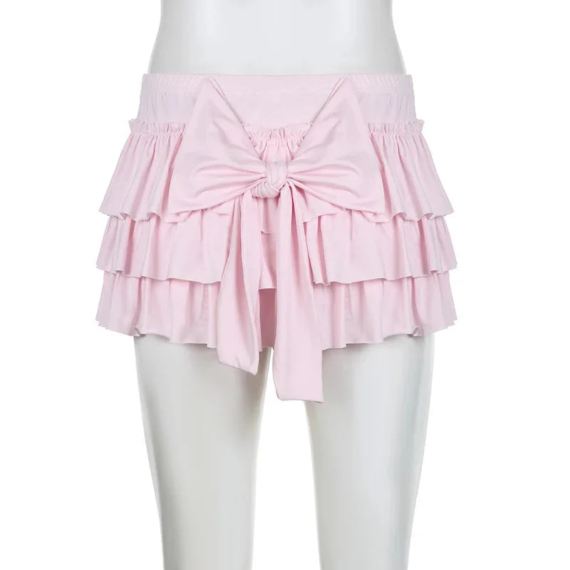 Mia - Shorts with ruffled hem and satin bow detail