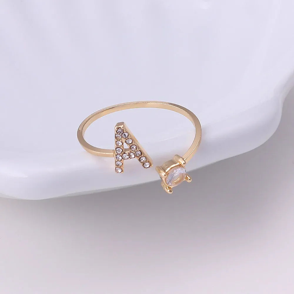 Ava - Personalised initial ring with solitaire diamond