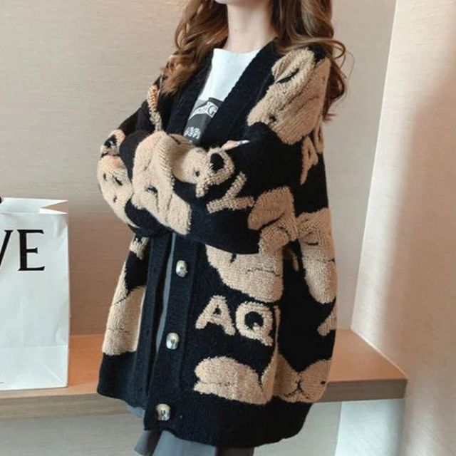 Chunky knit cardigan with playful patterns