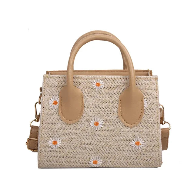 Daisy - Woven handbag with floral accents