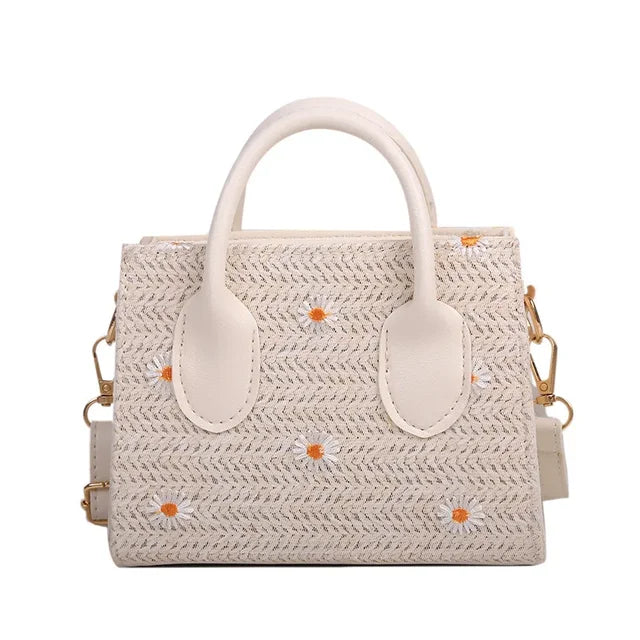 Daisy - Woven handbag with floral accents