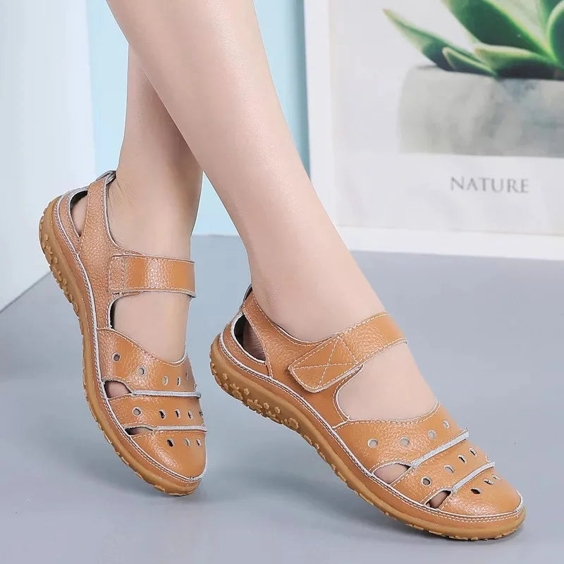 Bethany - Flat sandals in hollowed-out leather