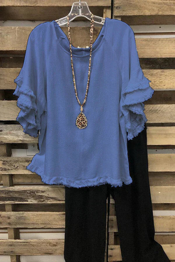 Ruffled cotton blouse with round neckline