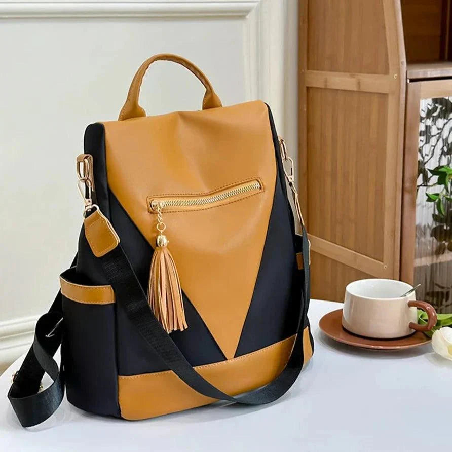 Valencia - Backpack in two-colour look with tassel pendant