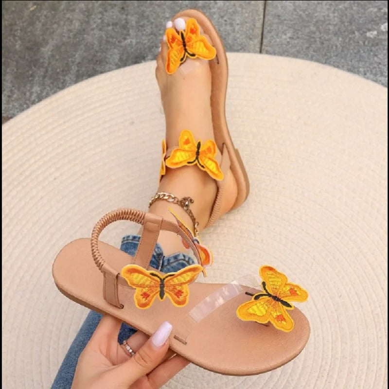 Beverly - Flat sandals with butterfly decoration for women